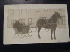 Postcard - woman in a horse drawn sleigh (1913 unposted but written)