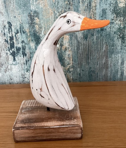 Carved wooden duck - carved, base