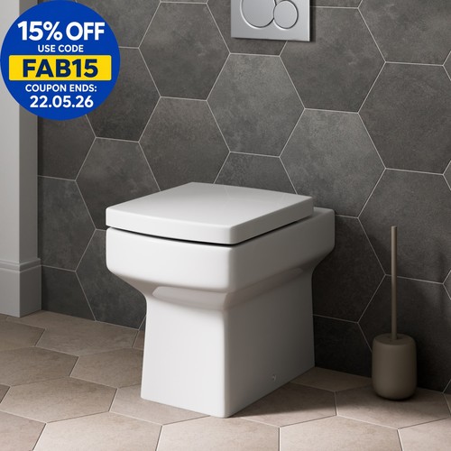 Btw back wall toilet - to,