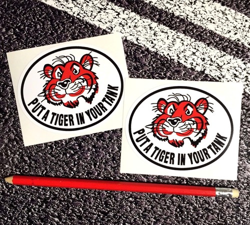 Esso put tiger your - tiger, in