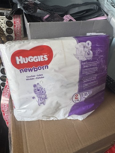 Opened full pack huggies - opened,