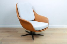 A mid-century lounge chair in the style of the Flexform Svena by Carlo Colombo