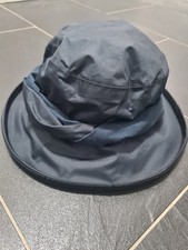 New and unworn waterproof navy blue rain hat with brim - Size S