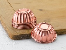 vintage coppered aluminium individual fluted jelly moulds - late 1900's