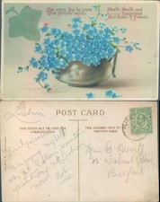 Blue flowers in a vase with greeting Valentine Sons Ltd Floral Gardens Greetings