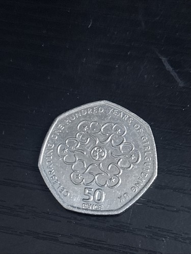 50p coin celebrating - 50p, one
