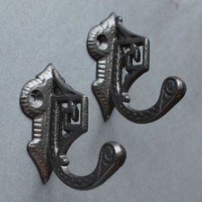 PAIR OF ART DECO CAST IRON