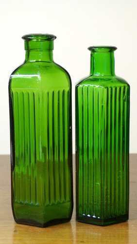 Pair green chemist bottles - pair,