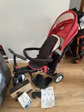 SmarTrike 7in1 Model#500 Red And Black Trike With Rain cover