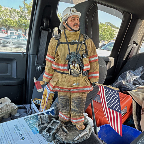 Firefighter figurine statue - firefighter,