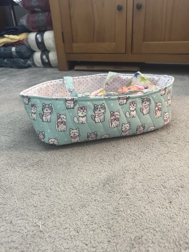 Handmade quilted doll carry
