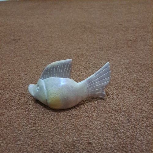 Small carved polished stone - polished,