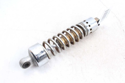 Rear shock absorber strut