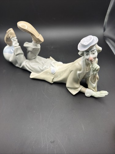 Lladro clown lying down with - "clown,