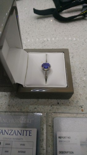 Ladies tanzanite and diamond - and,