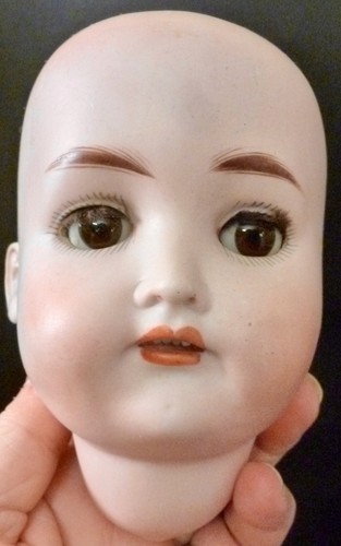 Antique bisque doll - ,