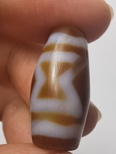 A vintage Tibetan agate Dzi
