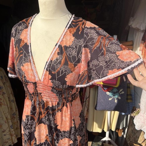 70s peach and black floral