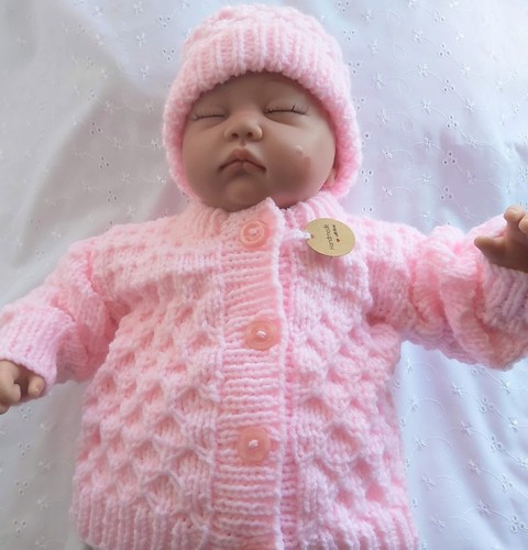 Hand knitted baby - hand, aran