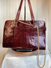 A VINTAGE RED SNAKESKIN  JANE
