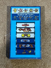 TOMY POCKETEERS POCKET GAME - ROBOT FACTORY - FREE UK POSTAGE!!
