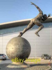 Photo 6x4 Runner Statue at