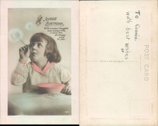 Child blowing bubbles Birthday Children