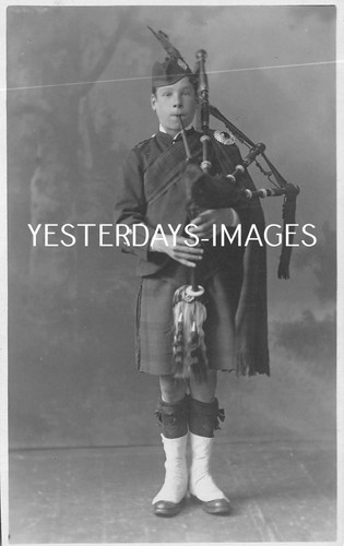 Boy highlander playing the - highlander,
