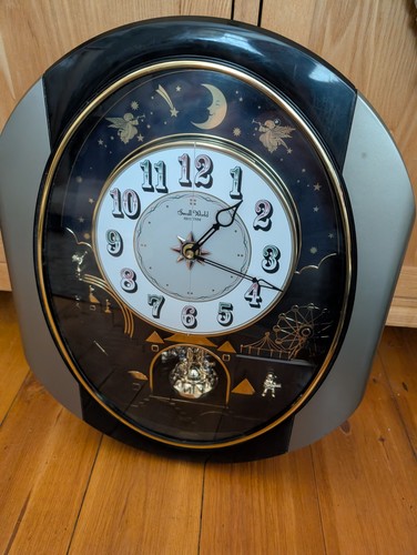 Small world rhythm clock - world,