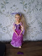 DISNEY STORE RAPUNZEL DOLL - 16 INCH - SINGING DOLL