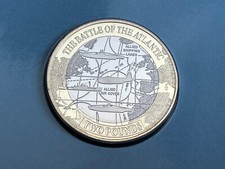 Gibraltar pound coin battle - pound,