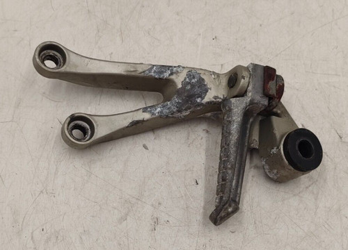 Right rear footpeg support - support,
