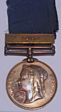 1887 Queen Victoria Metropolitan Jubilee Medal with 1897 bar to PC T Scammell