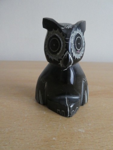 Carved stone owl - stone,