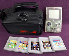 NINTENDO GAMEBOY POCKET CLEAR CONSOLE & GAMES BUNDLE GC INC OFFICIAL CARRY CASE