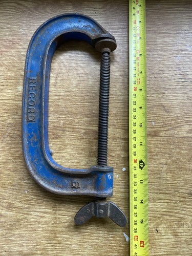 Record clamp made - record,