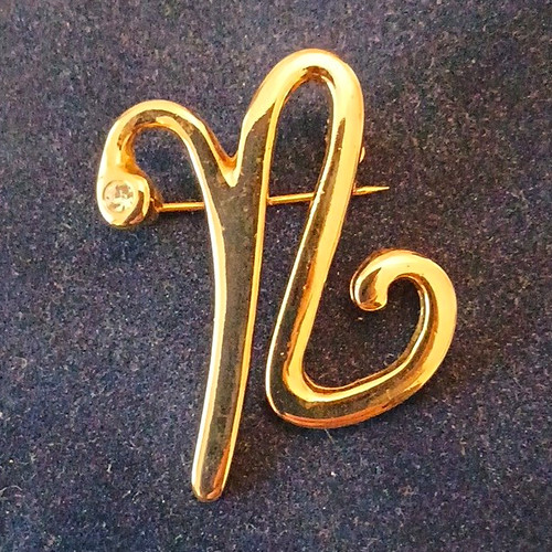 Gold tone letter - gold,