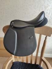16"  Changeable gullet synthetic saddle black with full set of bars (5) 