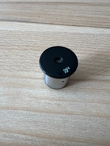 Microscope eyepiece with scale