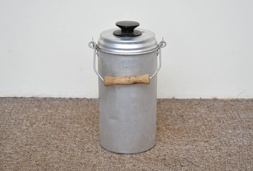 Vintage old aluminium milk