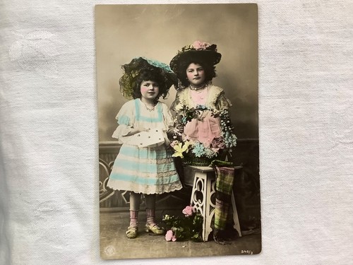 Two girls with basket - a, of