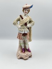 Antique Ceramic Bisque Figure Of Man In Kilt. Hand painted Figurine