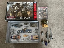 Transformers Unite Warriors Bruticus + PE Guns & Head & KO PE Hands & Feet
