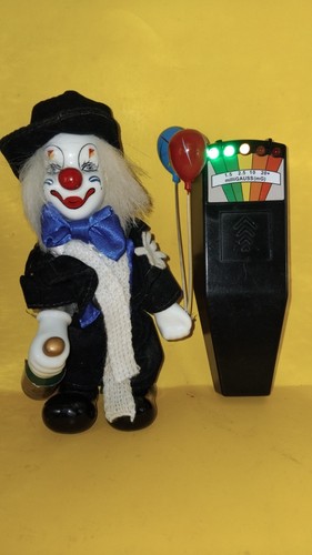 Haunted clown doll - clown,