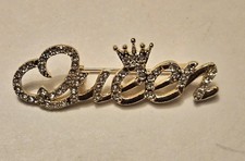 Costume Brooch With Rhinestones. The Word Queen