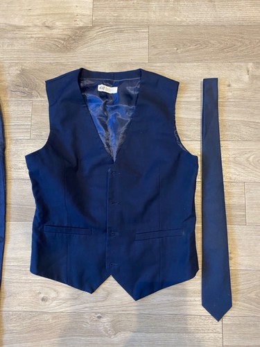 Blue waistcoat and - , tie