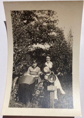 Two women motorcycle with - two, in