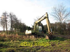 Photo 6x4 Parked beside a
