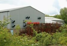 PHOTO  DOWDESWELL FACTORY EAST (2) STILLAGES STACKED BESIDE BUILDINGS AT THE LOO