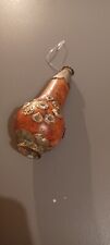 Antique Gourd Decoration with intricate metal inserts and hanging furniture.